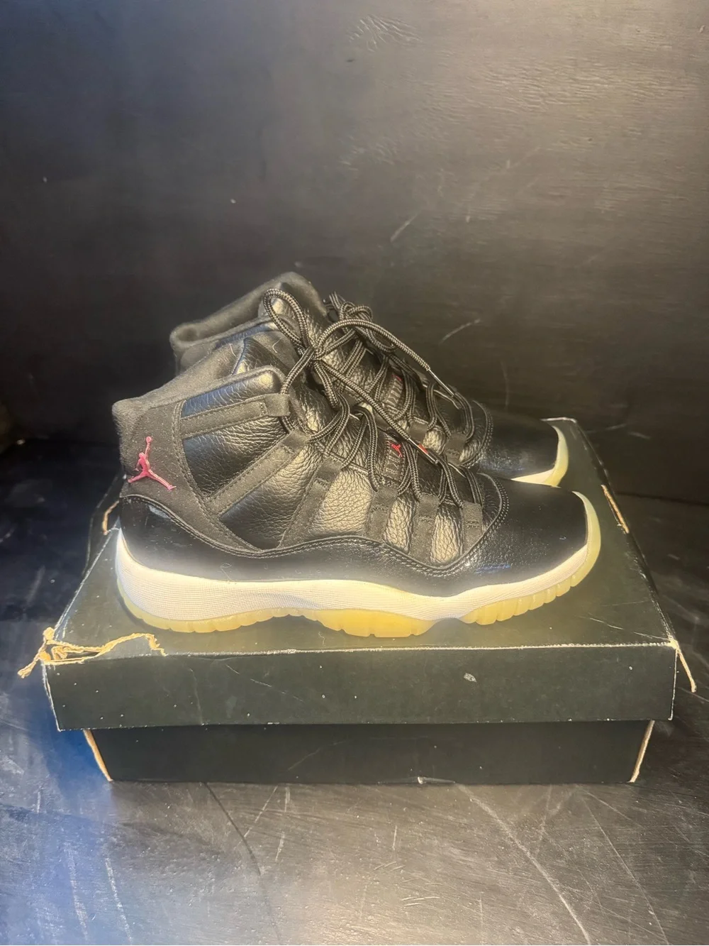 Jordan 11 Retro Mid Black with Gum Sole and Red Jumpman